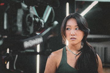 A dancer in the studio with the gimbal camera behind her