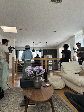 Crew working across the living room and kitchen