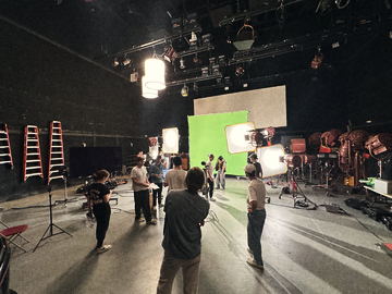 Wide view of the green screen setup on the soundstage
